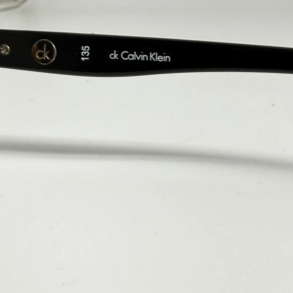 Calvin Klein CK4215S Cat Eye Sunglasses Black Honey Brown Gradient 53-15-135